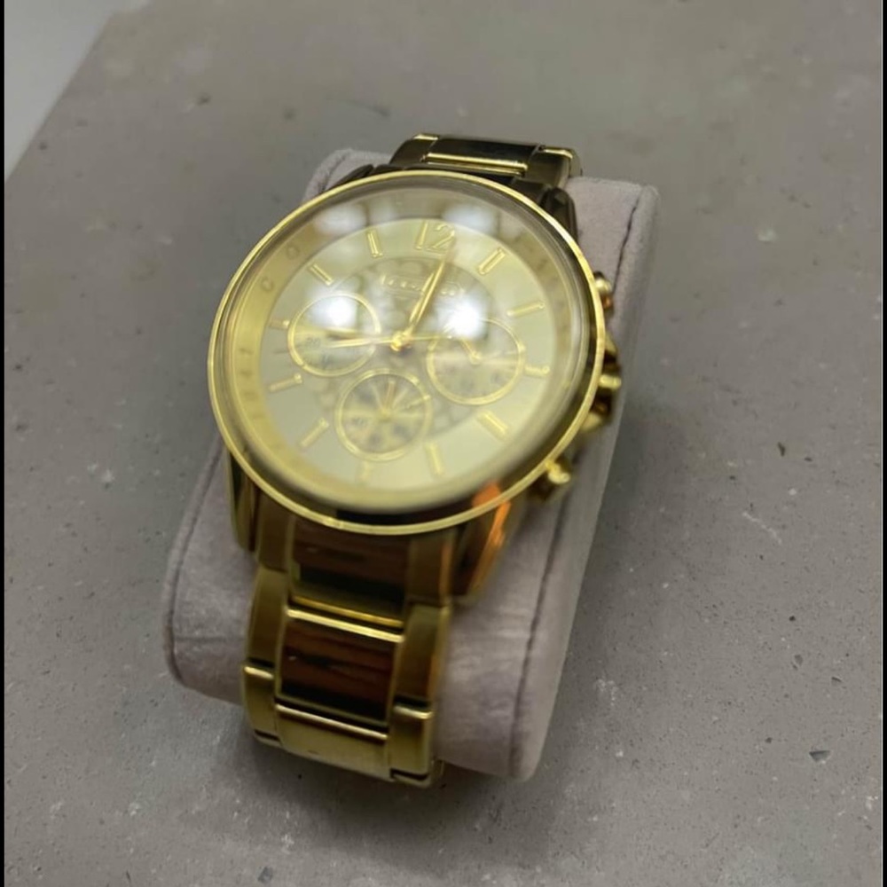 Gold coach watch